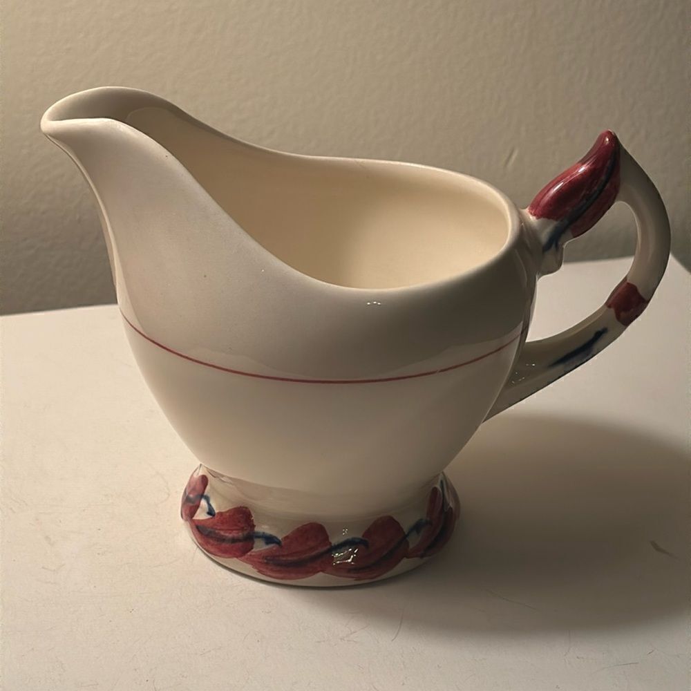 Small Hand painted Vernon Kilns cream colored ceramic creamer with handle